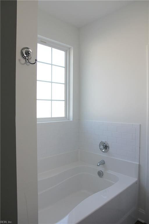 bathroom featuring a bathing tub