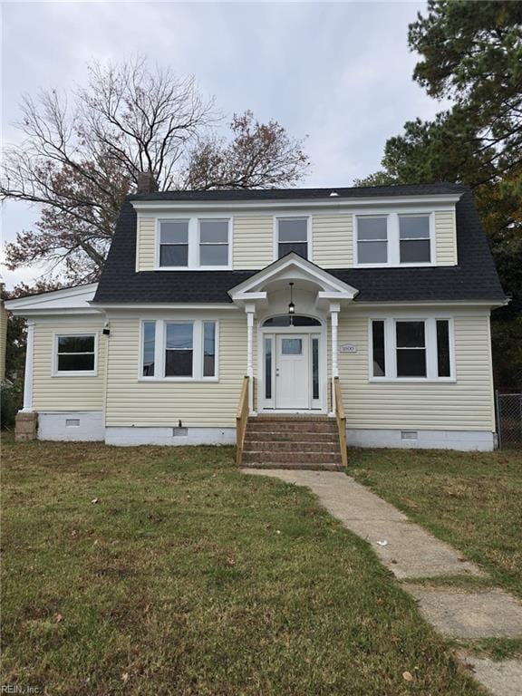 view of front of home featuring a front yard