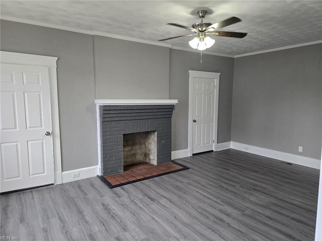 unfurnished living room featuring a fireplace, hardwood / wood-style flooring, ceiling fan, and ornamental molding