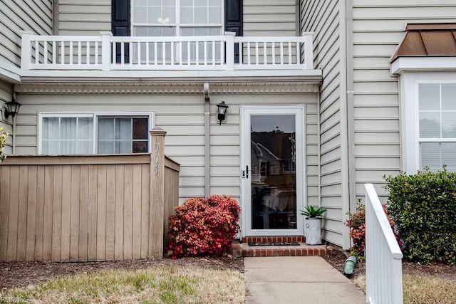 doorway to property featuring a balcony