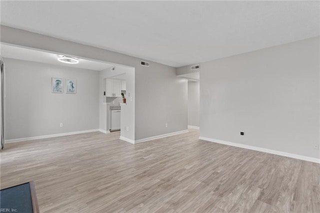 unfurnished living room featuring light wood-type flooring