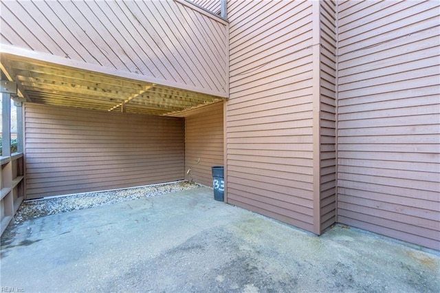 view of patio / terrace featuring a carport