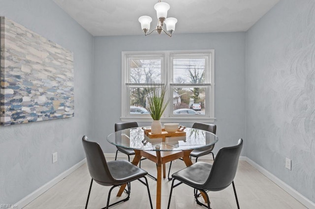 dining area with a notable chandelier