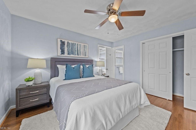 bedroom featuring ceiling fan and hardwood / wood-style flooring