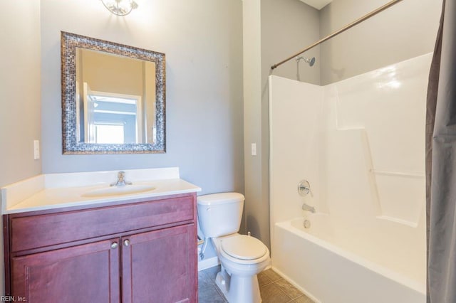 full bathroom with toilet, vanity, tile patterned floors, and shower / bathing tub combination