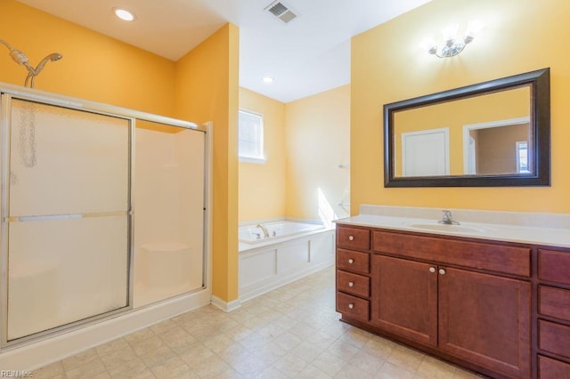 bathroom with vanity and plus walk in shower