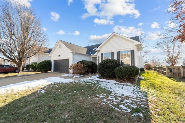 view of front of house featuring a garage and a front yard