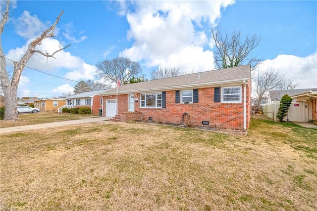 single story home featuring a garage and a front yard