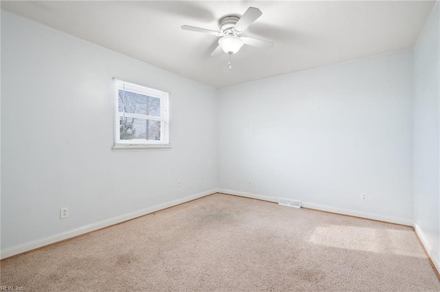 empty room featuring ceiling fan