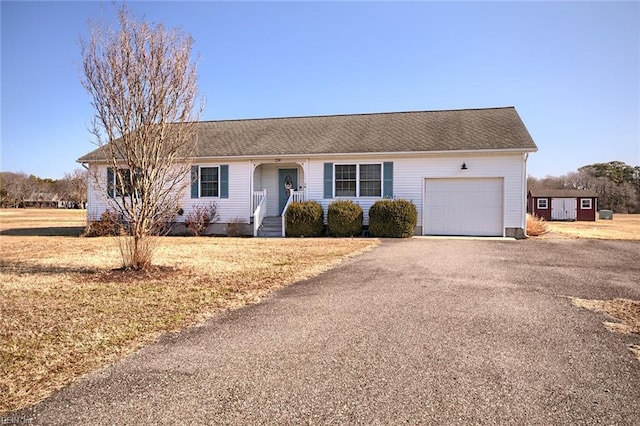 single story home with a garage