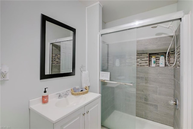 bathroom with vanity and an enclosed shower