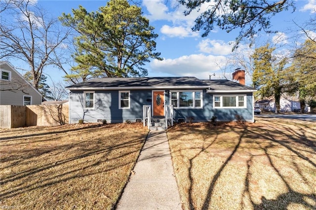 ranch-style house featuring a front lawn