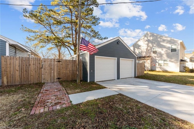 garage with a lawn