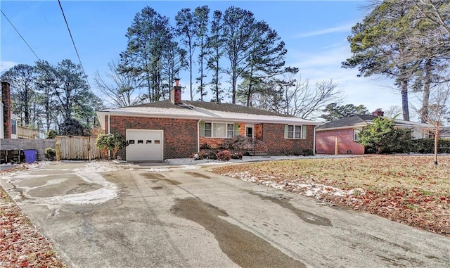 single story home featuring a garage