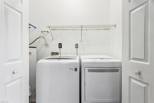 laundry area featuring washer and clothes dryer