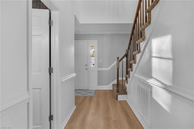 entrance foyer with light wood-type flooring