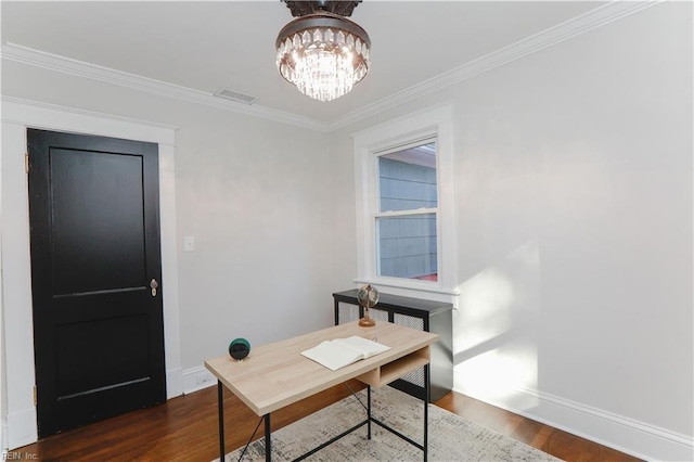 home office with dark hardwood / wood-style flooring, ornamental molding, and a chandelier