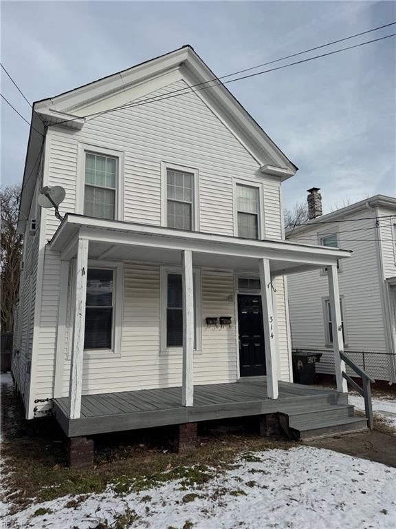 view of front property with covered porch