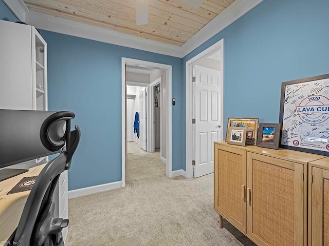 carpeted office with ornamental molding and wooden ceiling