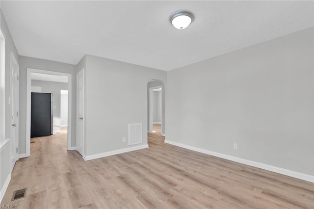 unfurnished room featuring light wood-type flooring