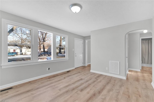 empty room featuring light hardwood / wood-style floors