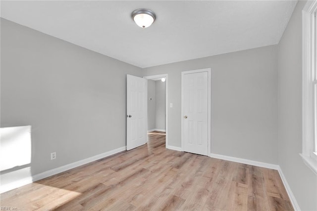 interior space featuring light hardwood / wood-style flooring and a closet