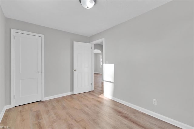 unfurnished bedroom featuring light hardwood / wood-style floors