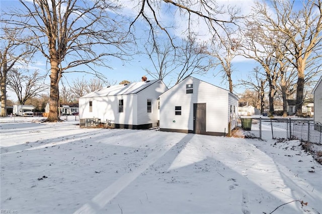 view of snow covered house