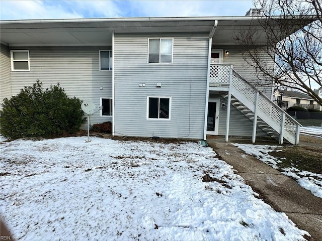 view of snow covered property