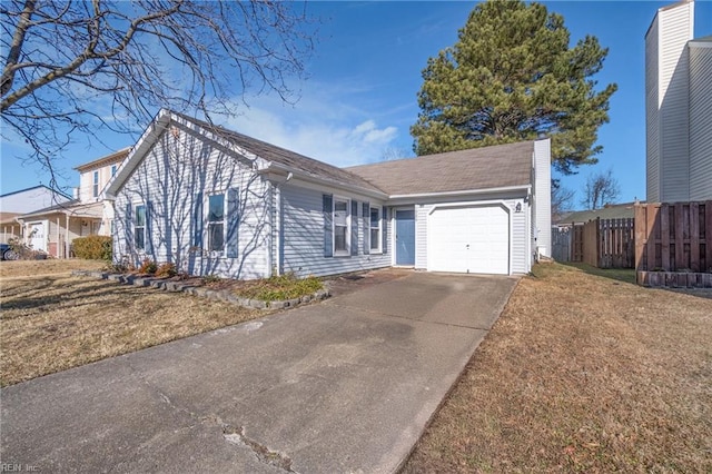 ranch-style home with a garage and a front lawn