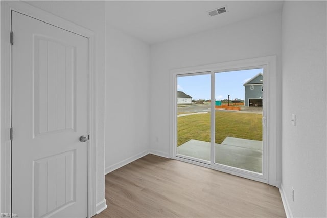 empty room with light wood-type flooring