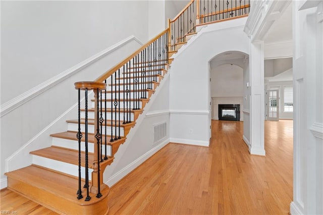 stairway featuring hardwood / wood-style flooring