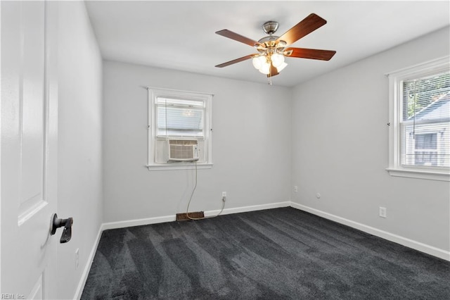 carpeted spare room with cooling unit and ceiling fan