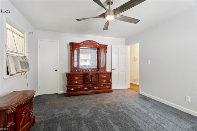 bedroom featuring ceiling fan and dark colored carpet