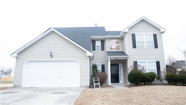 view of front of property featuring a garage