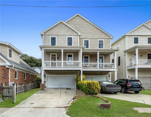 view of front of home featuring a garage and a front lawn