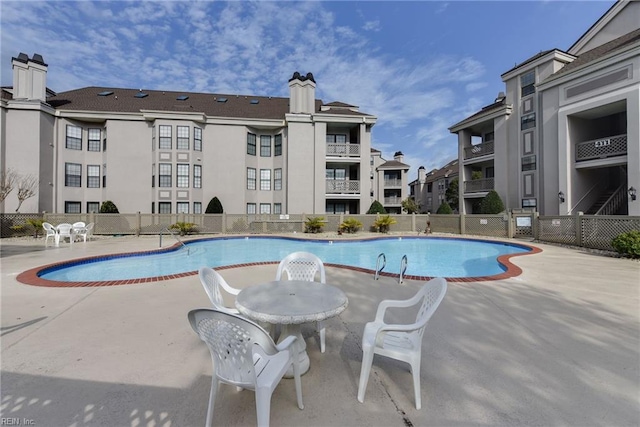 view of pool with a patio