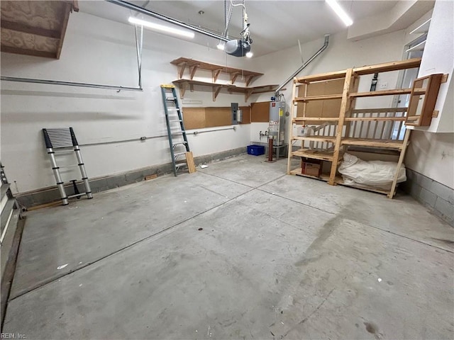 garage with electric panel, gas water heater, and a garage door opener