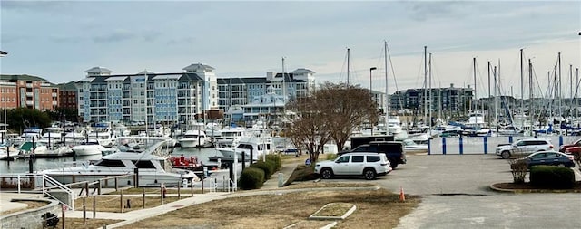 view of car parking with a water view