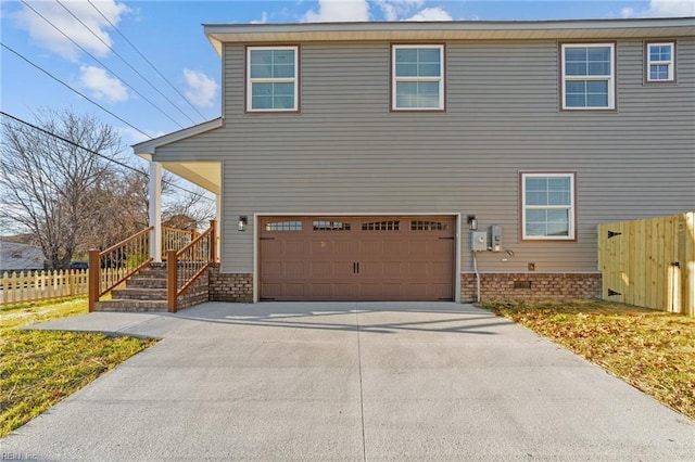 view of side of home with a garage