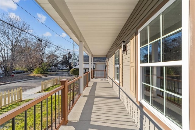 balcony featuring covered porch