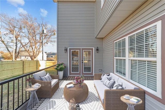 wooden deck featuring an outdoor living space