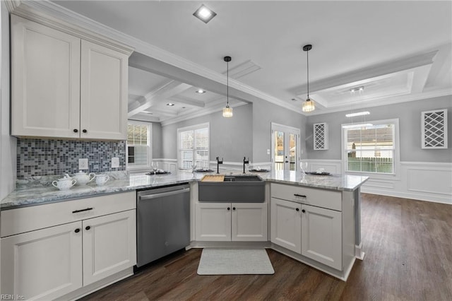 kitchen featuring sink, dishwasher, white cabinetry, and light stone counters