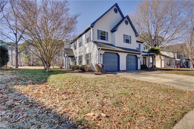 view of front of house featuring a garage and a front lawn