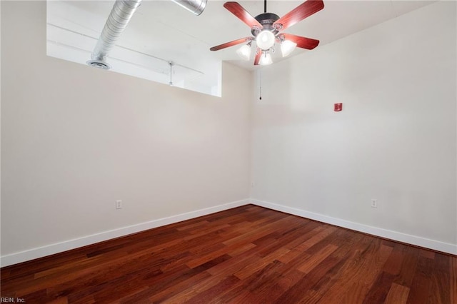 unfurnished room with hardwood / wood-style flooring and ceiling fan