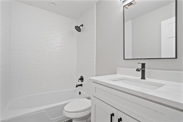 full bathroom featuring vanity, toilet, and tiled shower / bath combo