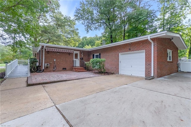 single story home with a garage