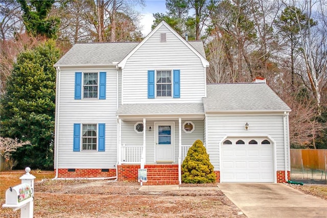 front of property featuring a garage