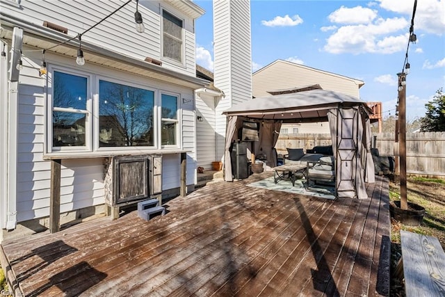 wooden terrace with a gazebo