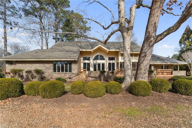 view of front facade with a deck